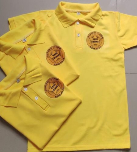 yellow branded polo shirt